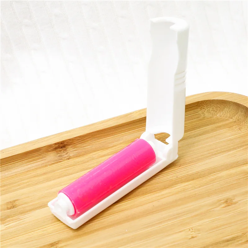 Hd855cee21cd94fd4af6471871ce5a00bt alt="پرزگیر ژلهای جیبی کوچک برای جمعآوری مو و پرز حیوانات"